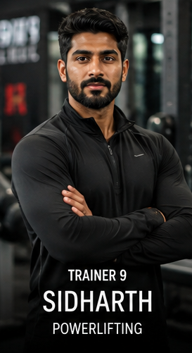 Trainer 9, Sidharth, Powerlifting specialist, standing arms crossed on the gym floor.